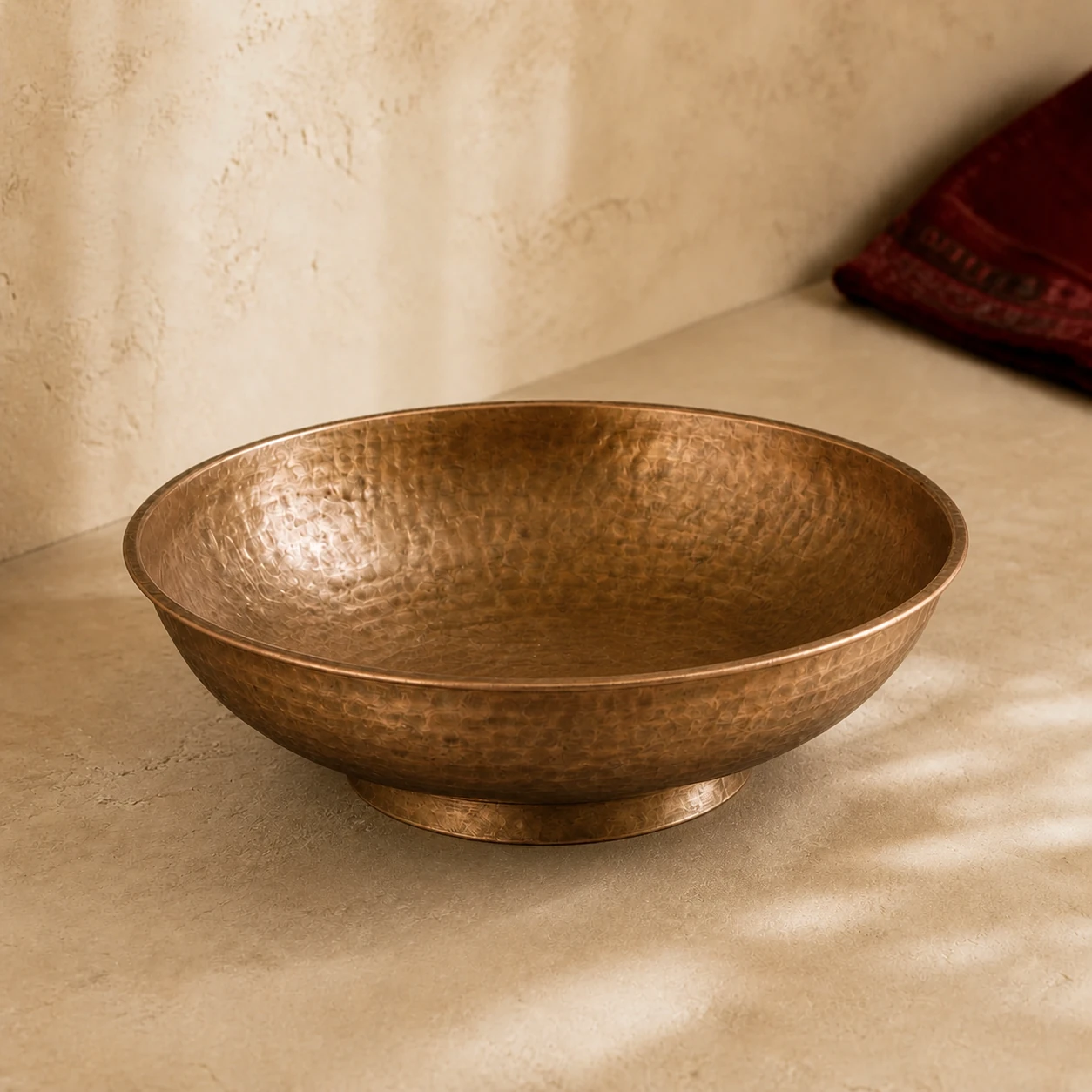 Representative bell metal bowl in a warm Indian home setting